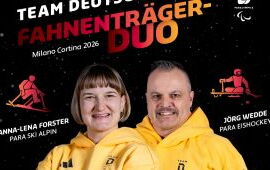 Anna-Lena Forster und Jörg Wedde. Im Hintergrund der Schriftzug "Team Deutschland - Fahnenträger-Duo".